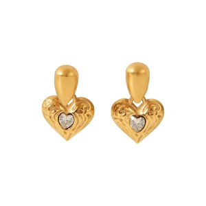 Detail of 18K gold-plated textured heart earrings with sparkling heart-shaped zircon