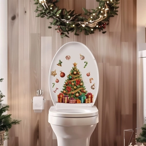 Detail of waterproof Christmas tree PVC sticker applied to a white toilet lid