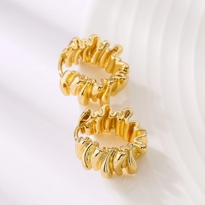 Minimalist 18K gold plated hoop earrings featuring a vintage wavy textured design