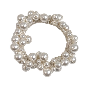 Elegant white faux pearl elastic hair tie featuring various bead sizes on white background