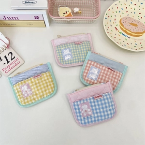 Quilted cotton card holder featuring bear patches and secure zipper closure for students