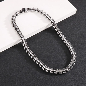 Detailed view of silver stainless steel keel chain necklace with punk style links