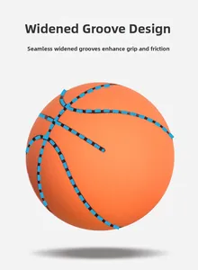 Detail view of 6cm orange mini basketball featuring widened groove design for enhanced grip