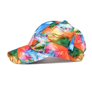 Side view of six-panel tie-dye baseball cap featuring vibrant multi-color feather patterns