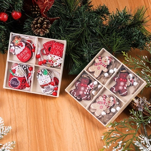 Christmas wooden gingerbread man and cocoa cup ornaments set in a decorative gift box
