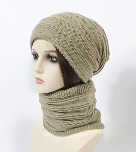 Detailed knit texture of khaki winter beanie and neck warmer set for outdoor warmth