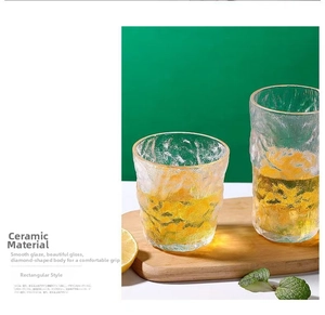 Detailed view of heat-resistant glacier textured glass cup with a diamond hammer pattern