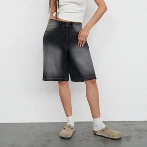 Slim-fit black washed denim shorts for women with vintage distressed texture