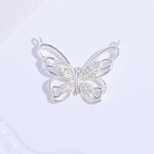 Close-up of S925 sterling silver butterfly pendant with sparkling cubic zirconia stones