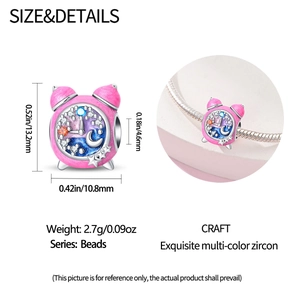 Pink alarm clock charm with cubic zirconia details and sizing measurements shown