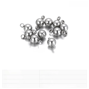 Detailed view of 5mm stainless steel bead pendants with double loops for DIY jewelry