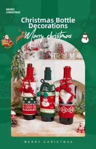 Detailed view of three knitted Christmas wine bottle covers with reindeer and snowman patterns