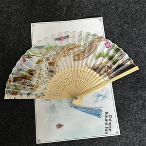 Detailed view of a Chinese folding fan with Along the River During the Qingming Festival art
