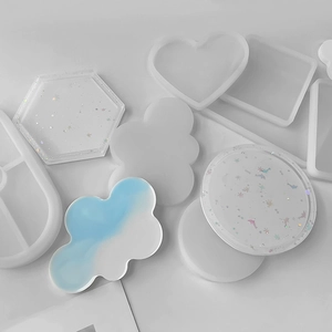 Silicone coaster molds set featuring cloud heart and geometric shapes for resin casting