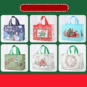Set of six festive Christmas non-woven gift bags with reindeer and Santa Claus designs