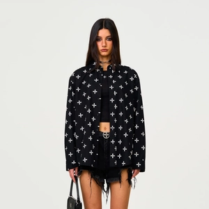 Black cotton shirt with all-over white cross floral print and long sleeves for street style
