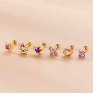 Set of 6 gold stainless steel stud earrings with purple zircons in flower and star shapes