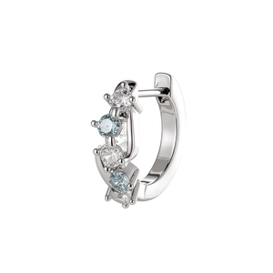 Minimalist silver hoop earrings with alternating blue and clear cubic zirconia stones
