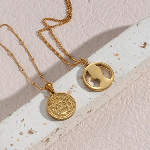 Classic gold coin pendant necklace set with vintage portrait silhouette and Dos Pesos 1945 engraving