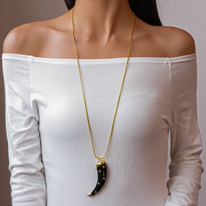 Retro horn pendant necklace with gold dots on a minimalist gold chain for women