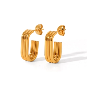 Detail of 18K gold-plated stainless steel earrings with triple ridge line textures