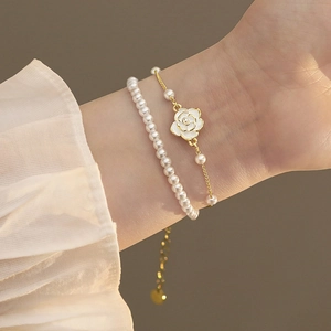 Elegant 18k gold plated pearl bracelet set with camellia floral charm for women