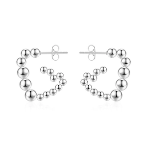 Polished silver metal heart-shaped bead earrings with 18K gold plating minimalist style