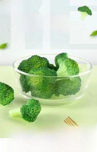 Detailed macro shot of realistic broccoli food model in a clear glass bowl for props