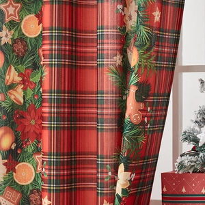 Christmas curtains with red plaid pattern and festive pine cones decoration