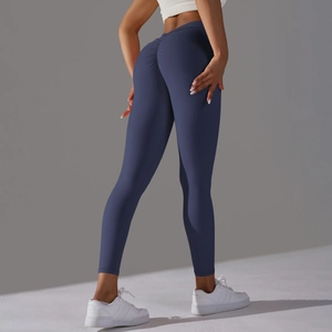 Detail of high waist scrunch butt yoga pants in navy blue with squat-proof fabric