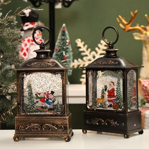 Bronze Christmas lanterns with glowing snow scene, Santa and Snowman holiday music box