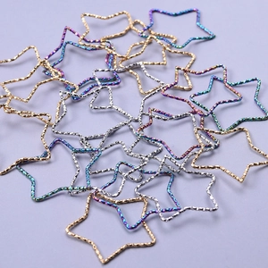 Mix of 18k gold and silver star pendants in geometric 304 stainless steel texture
