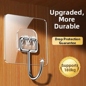 Detail of adhesive screw hook showing heavy-duty load capacity of 90kg on wooden surface