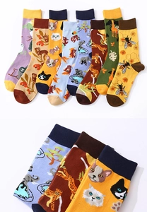 Group of cotton crew socks featuring colorful animal patterns like cats and elephants