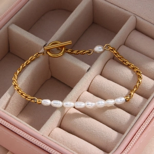 Chic gold OT clasp bracelet with twisted rope chain and white freshwater pearls in a pink box