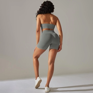 Macro shot of grey-green seamless ribbed yoga set with high waist and breathable fabric