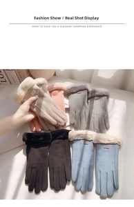Detail of winter warm faux suede gloves with fluffy faux fur cuffs in multiple colors