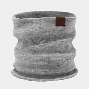 Detail of grey knitted neck warmer with winter snowflake leather patch and ribbed texture