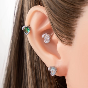 Oval zircon snake earrings in silver steel with green, clear and light blue gemstones