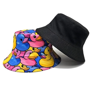 Reversible bucket hat set with black fabric and colorful little duck print pattern