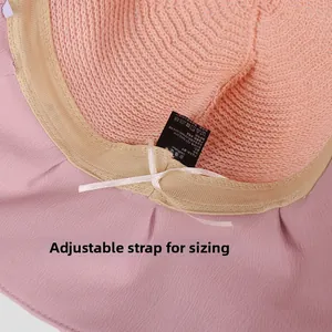 Detail of pink summer sun hat featuring adjustable inner drawstring and comfort sweatband