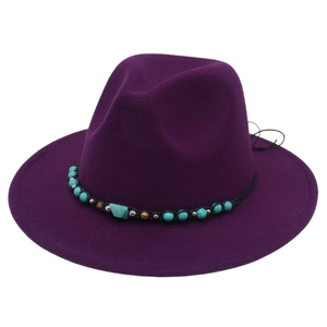 Top view of purple felt cowboy hat with bohemian turquoise beaded band and metal accents