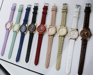 Detailed collection of 10 quartz watches in assorted colors with embossed leather straps