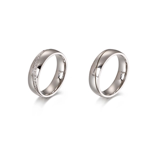 Minimalist silver couple rings with streamlined design and sparkling zircon inlays