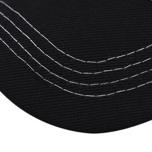 Detail of baseball cap brim featuring parallel white contrast stitching on black fabric