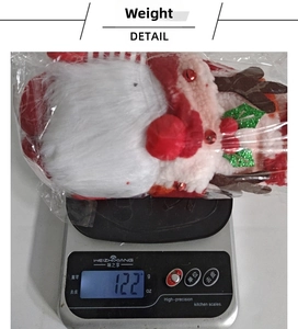 Weight measurement of a Christmas gnome plush with reindeer antlers and red sequins