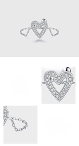 Dettaglio anello a cuore in argento S925 con zirconi 5A incastonati a mano con cura