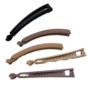 Set of 5 matte banana hair clips in neutral colors including black and beige tones