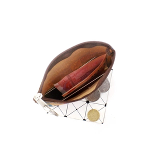Internal view of cork print coin purse showing interior capacity with zipper detail