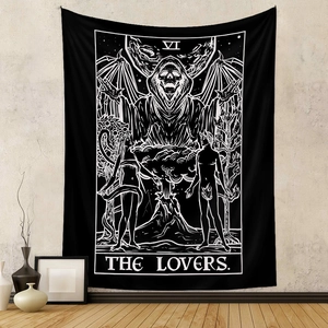Detailed close-up of the black and white tarot The Lovers tapestry in a home setting